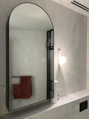 Mirror in a modern bathroom with custom lighting