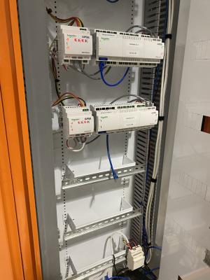 A cabinet full of Electrical equipment